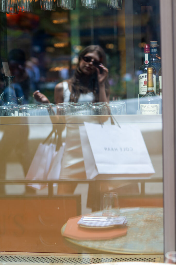 Window-reflection-NYC-senior-pictures-Paige-P-Photography